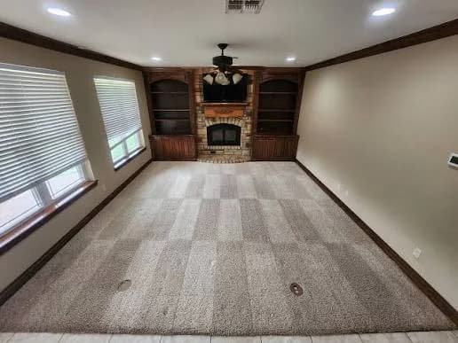 Empty carpeted room with visible professional cleaning passes